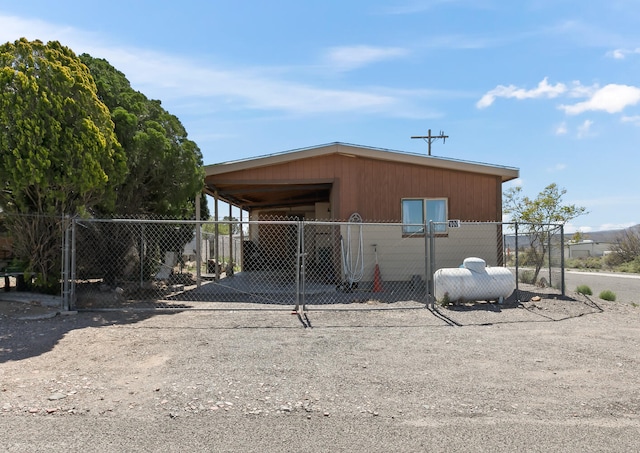 exterior space featuring a carport