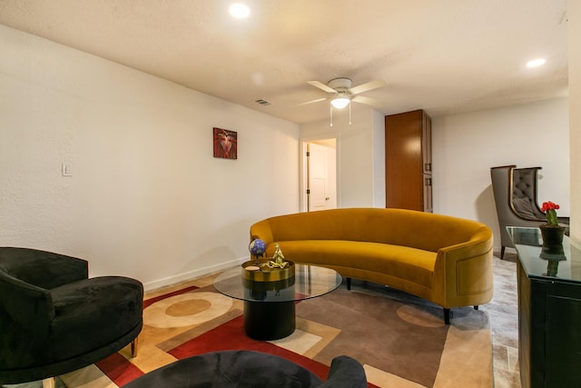 living room featuring ceiling fan