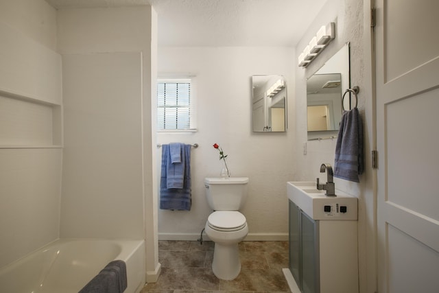 bathroom with tile patterned flooring, vanity, a textured ceiling, and toilet