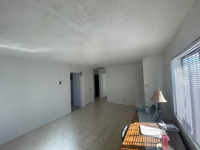 interior space with a textured ceiling