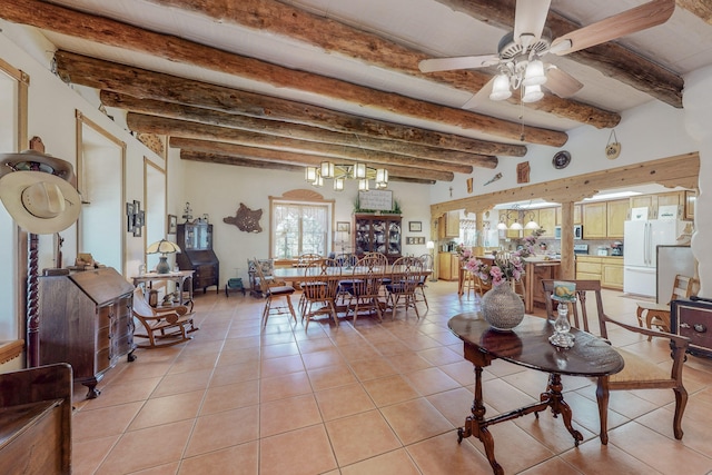 dining room with light tile patterned floors, beamed ceiling, and ceiling fan with notable chandelier