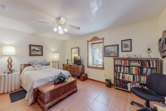 112 Ten Pines Rd, Torreon, NM 87061 - bedroom featuring light tile patterned flooring and baseboards