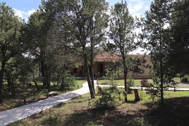 112 Ten Pines Rd, Torreon, NM 87061 - view of property's community featuring a lawn
