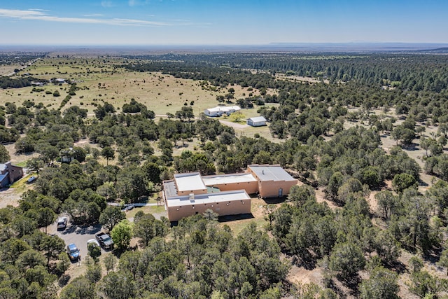 aerial view featuring a forest view