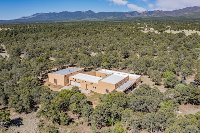 112 Ten Pines Rd, Torreon, NM 87061 - aerial view of a heavily wooded area and mountains