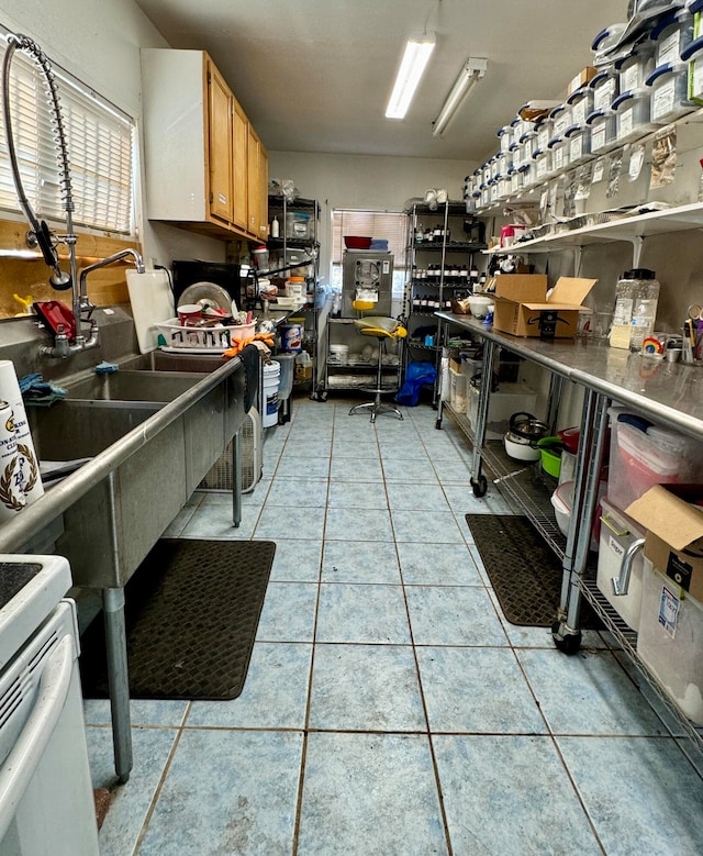 kitchen featuring light tile patterned flooring