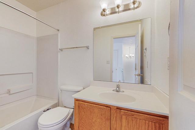 full bathroom featuring an inviting chandelier, toilet, shower / washtub combination, and vanity