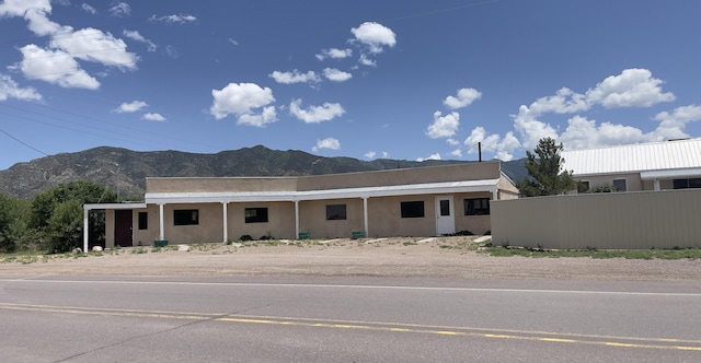 view of front facade featuring a mountain view