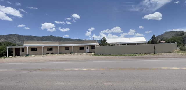 view of front facade featuring a mountain view