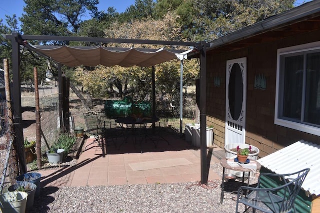 view of patio featuring a pergola