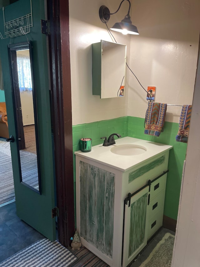 bathroom featuring vanity and tile patterned flooring