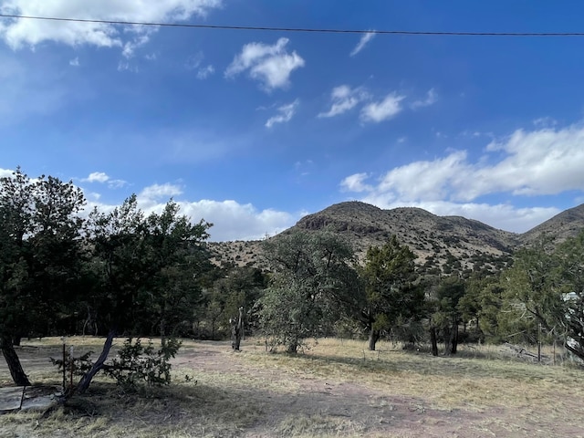 view of mountain feature with a rural view