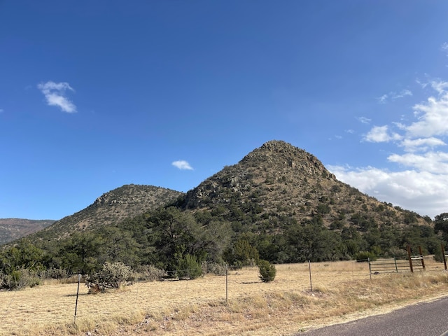 view of mountain feature with a rural view