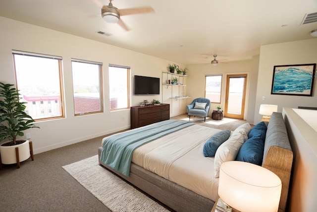 324 Broadway Blvd NE, Albuquerque, NM 87102 - bedroom with carpet flooring, ceiling fan, baseboards, and access to outside