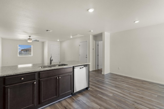 unfurnished living room featuring light hardwood / wood-style floors, ceiling fan, and sink