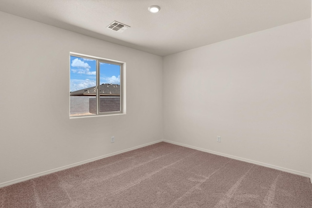 unfurnished room featuring carpet floors