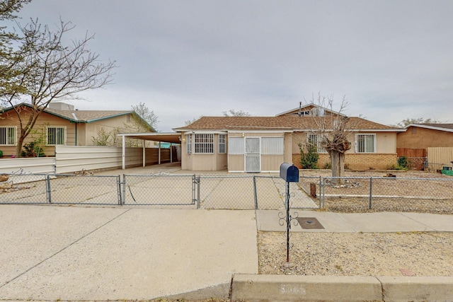 view of front of property with a carport