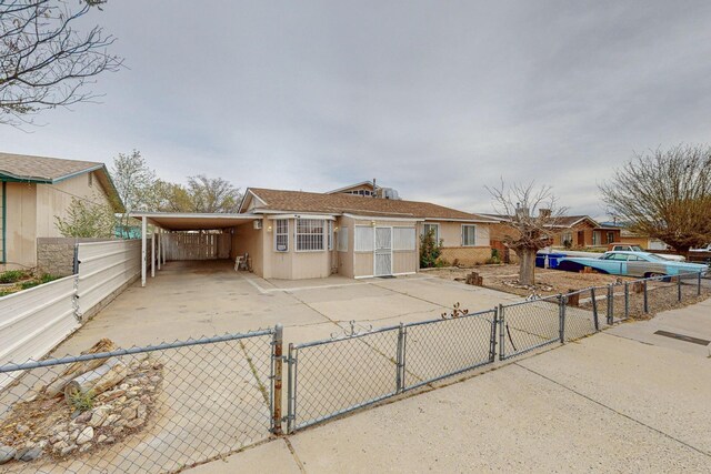 view of front of home with a carport