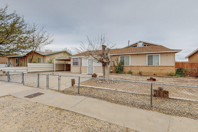 view of front of home featuring a carport