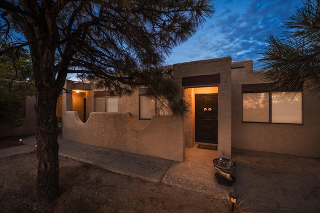 view of pueblo revival-style home