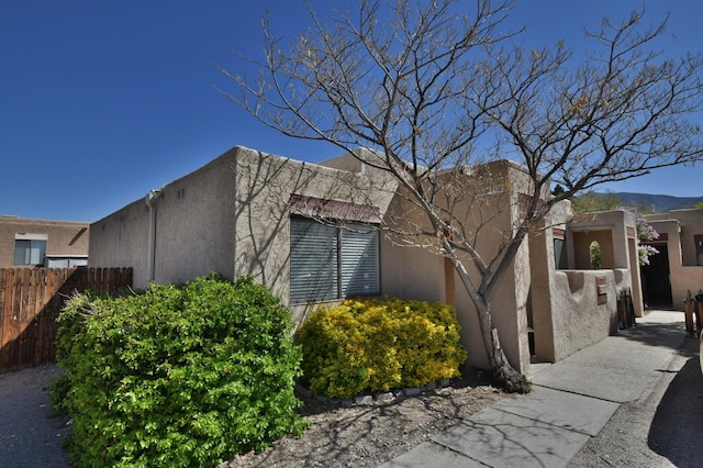 view of home's exterior featuring a mountain view