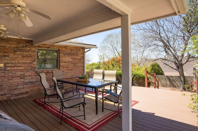 wooden deck with ceiling fan