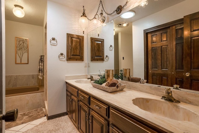 bathroom with dual bowl vanity and tile floors