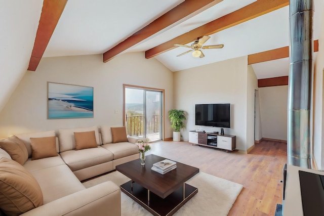 living room featuring lofted ceiling with beams, ceiling fan, and light hardwood / wood-style floors