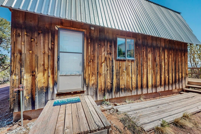 view of property exterior featuring an outbuilding