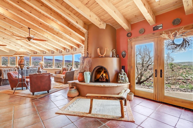 sitting room featuring a large fireplace, lofted ceiling with beams, and wooden ceiling