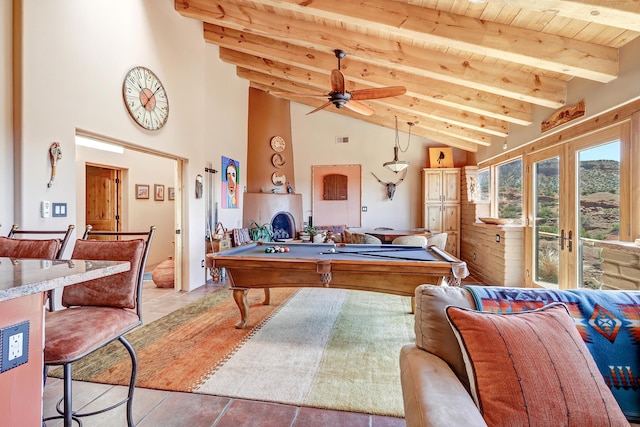 playroom with light tile patterned flooring, wood ceiling, beam ceiling, and french doors