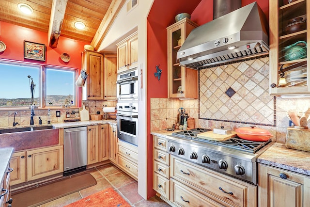 kitchen with extractor fan, appliances with stainless steel finishes, light tile patterned floors, light stone countertops, and wooden ceiling