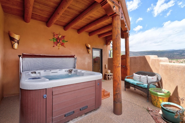 view of patio featuring a hot tub