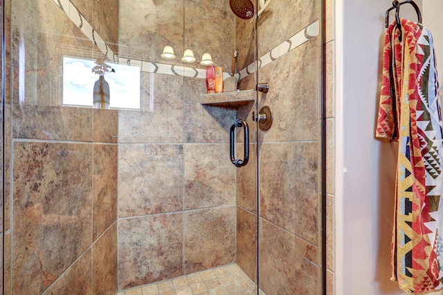 bathroom featuring an enclosed shower