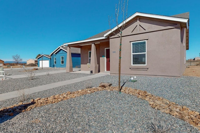 view of front of property featuring a patio area