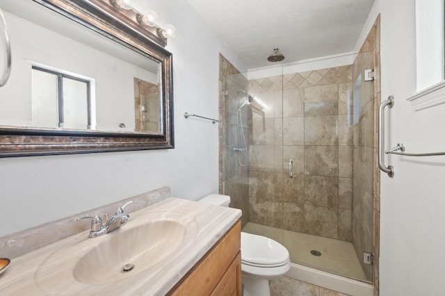 full bath with a shower stall, toilet, and vanity