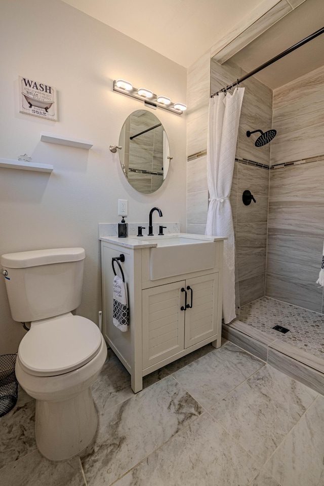 bathroom with a shower with curtain, vanity, and toilet