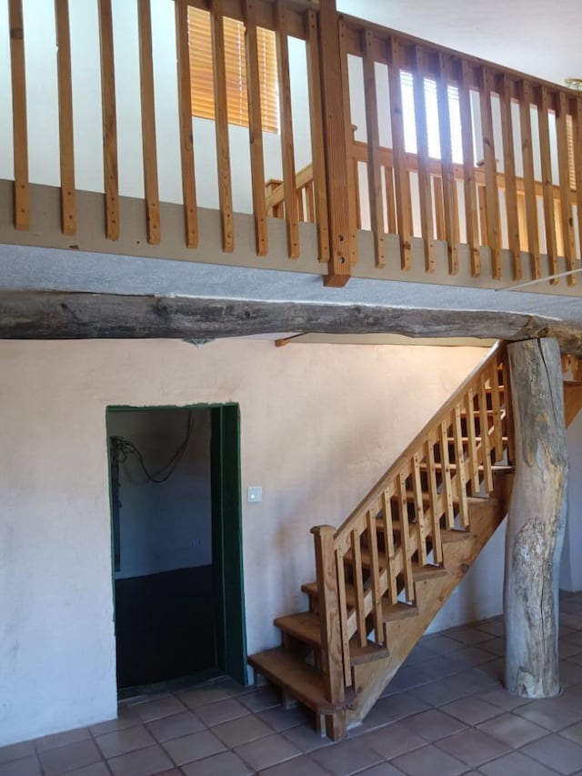 stairs with tile flooring