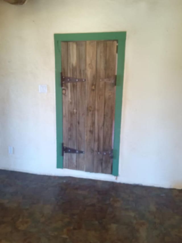 unfurnished bedroom with a closet