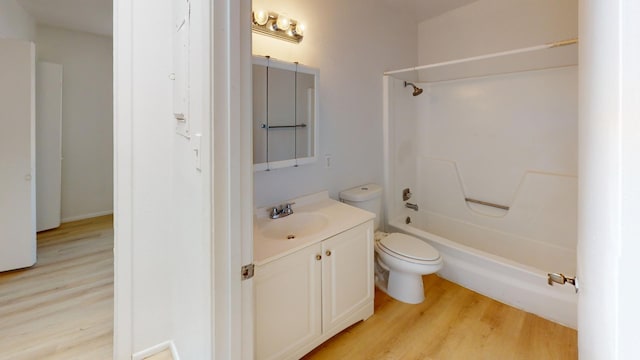 full bathroom featuring toilet, bathtub / shower combination, vanity, and wood-type flooring