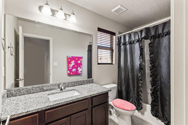 full bathroom with shower / tub combo, toilet, oversized vanity, and a textured ceiling