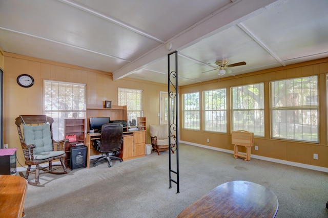 office space featuring ceiling fan, light colored carpet, and beam ceiling