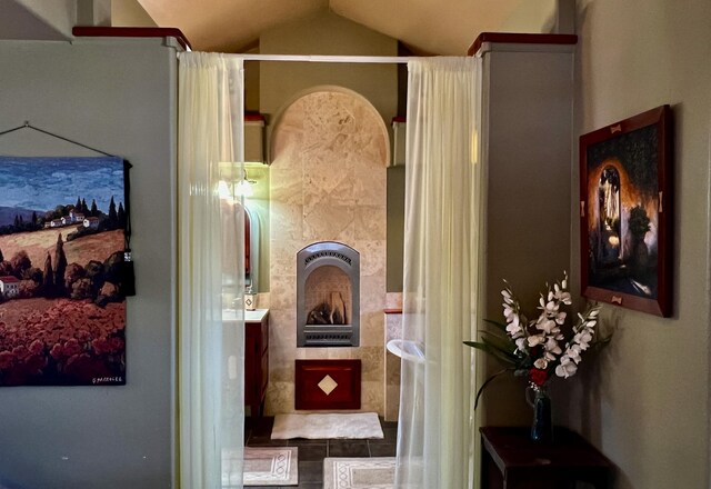 787 Timberlake Rd, Ramah, NM 87321 - tiled bedroom featuring a ceiling fan and vaulted ceiling