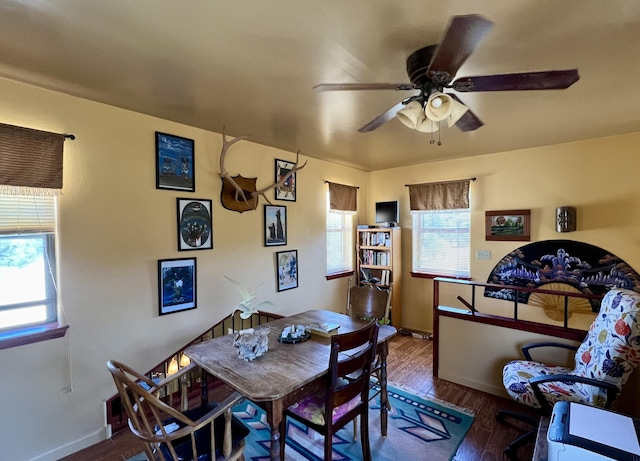 dining room featuring hardwood / wood-style floors, plenty of natural light, and ceiling fan