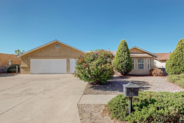 single story home featuring a garage