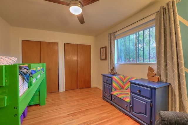 rec room with light wood-type flooring and ceiling fan