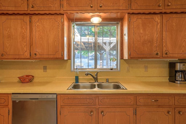 kitchen with plenty of natural light, sink, and stainless steel dishwasher