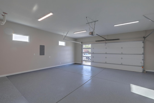 garage featuring a garage door opener and electric panel