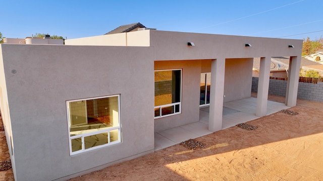 rear view of house with a patio area