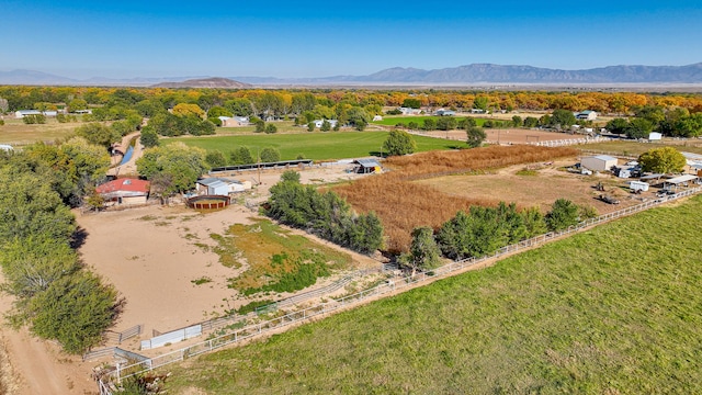 bird's eye view featuring a mountain view and a rural view